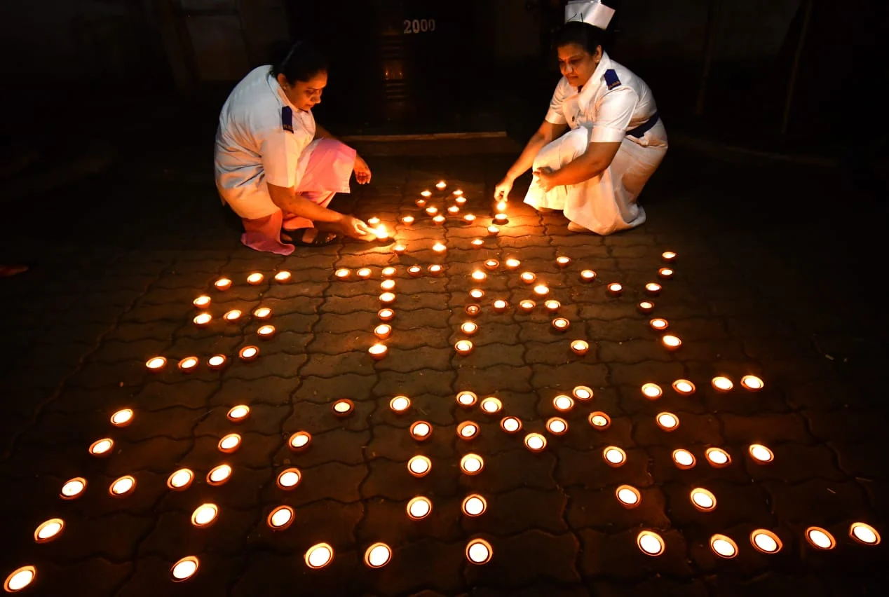 Nurses light lamps to mark unity against coronavirus fight at Dadar BMC Hospital