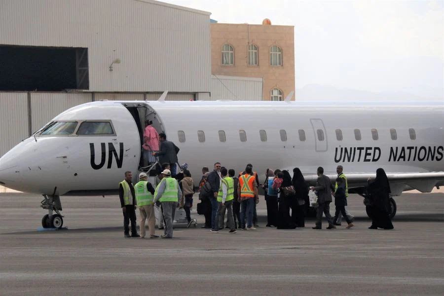Yemeni patients and relatives board the UN-marked plane at the Sanaa International Airport in Sanaa, Yemen, on Feb. 3, 2020. The World Health Organization (WHO) announced on Monday that the first flight carrying Yemeni patients in critical need of treatment left the country's rebel-held capital Sanaa.
