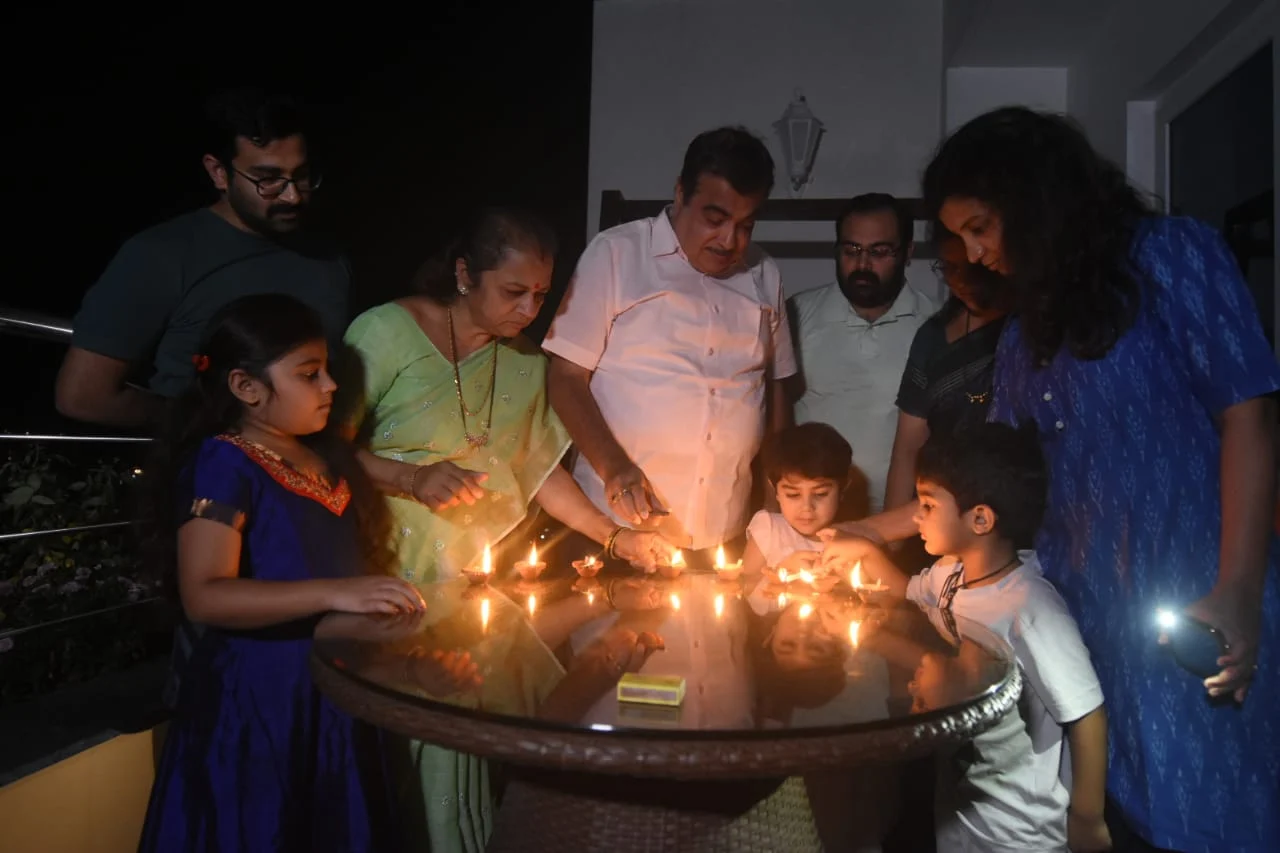 A family lighting lamps in Dombivli