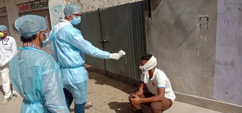 People being screened in Kitnoria village in Barmer