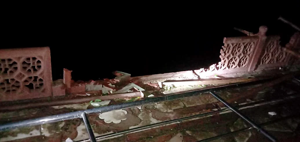 Railings around the Taj Mahal partially damaged and fallen on the floor following the heavy wind and rain, in Agra on Friday.