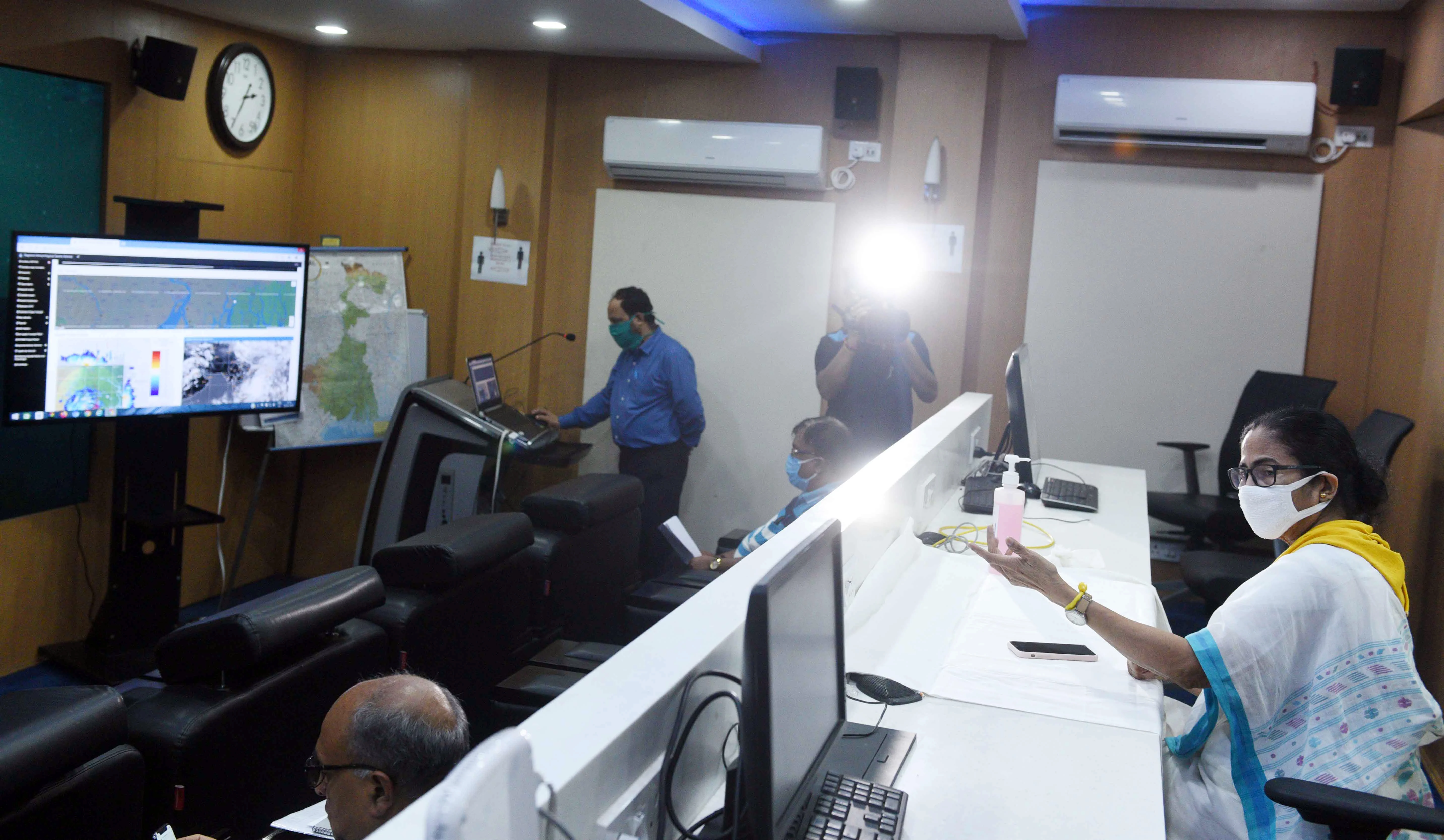 West Bengal Chief Minister Mamata Banerjee reviewing arrangements during cyclone Amphan at a control room set up in her office building, in Kolkata on Wednesday