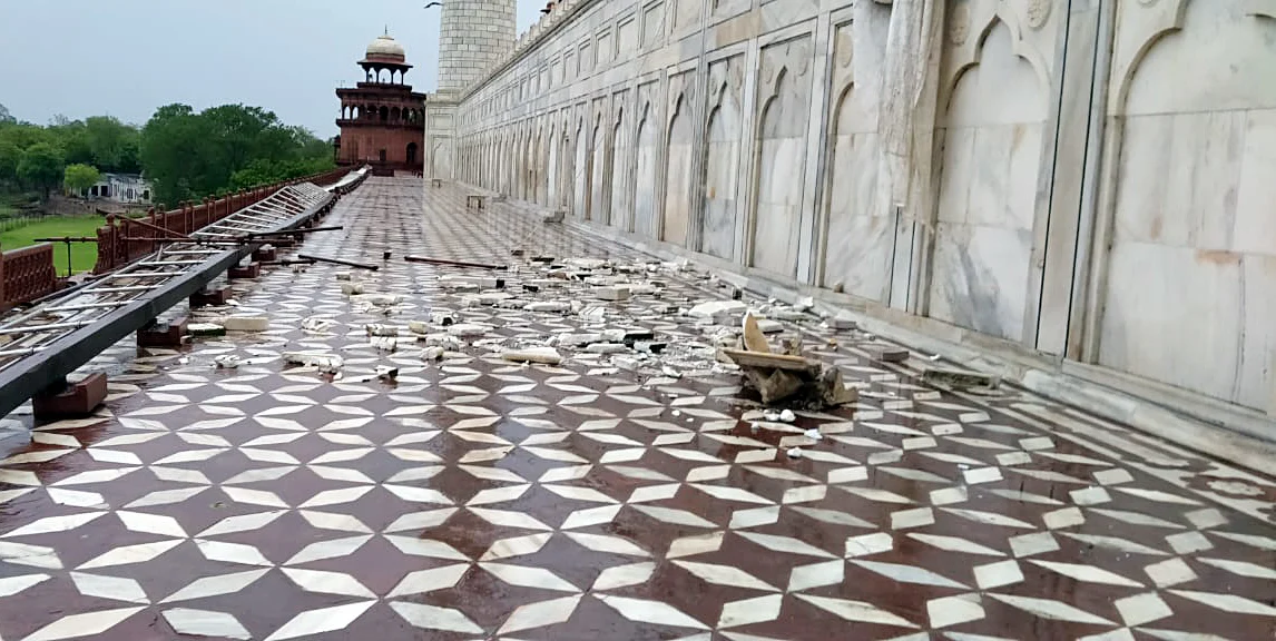 Railings around the Taj Mahal partially damaged and fallen on the floor following the heavy wind and rain, in Agra on Friday.
