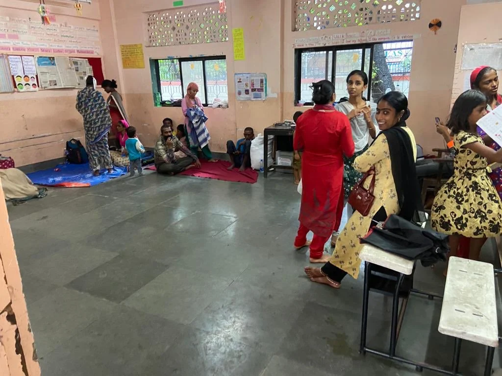 Residents in Mahim taking refuge in a municipal school