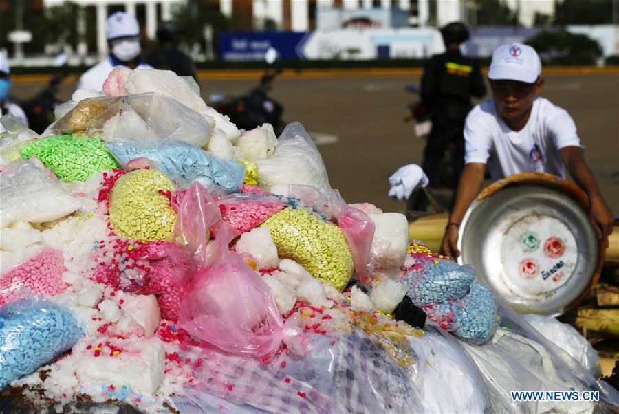 Drugs are piled up before being burnt down during a ceremony in Phnom Penh, Cambodia, on June 26, 2020. Cambodia on Friday burned down 477.7 kg of illicit drugs to mark the International Day Against Drug Abuse and Illicit Trafficking, officials said.