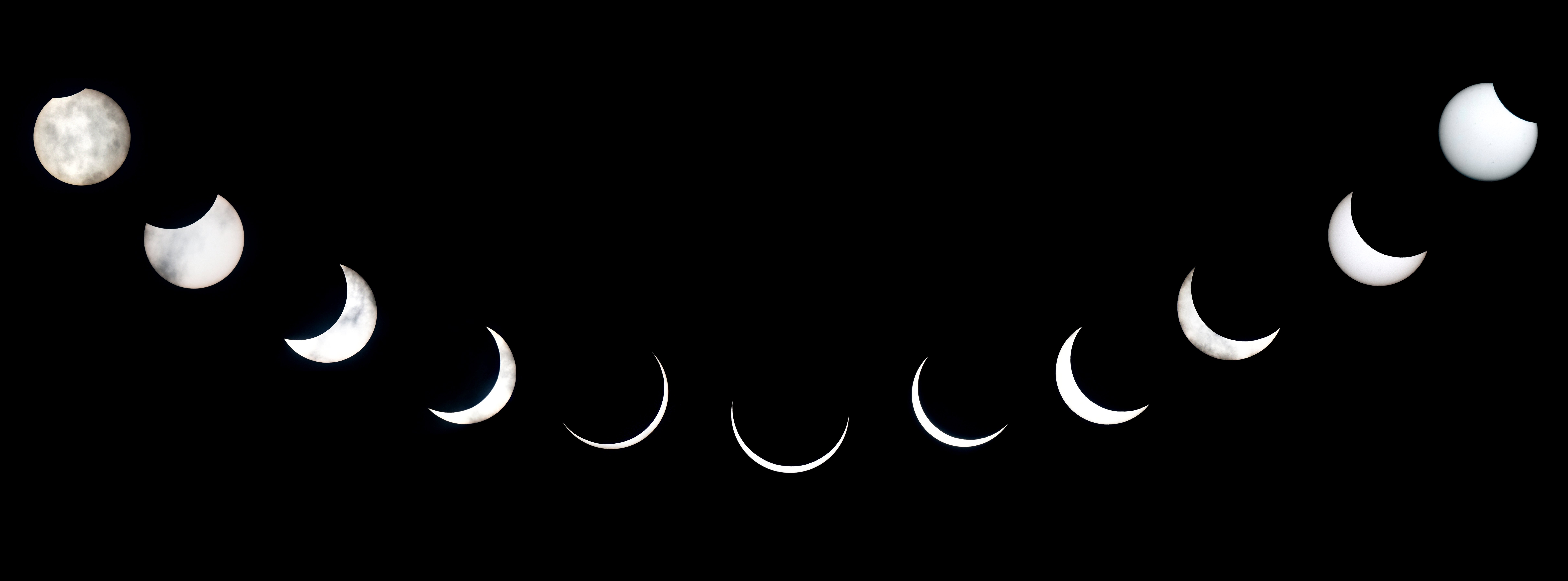 This combo picture shows various phases of the solar eclipse as seen in the sky from New Delhi, Sunday, June 21, 2020