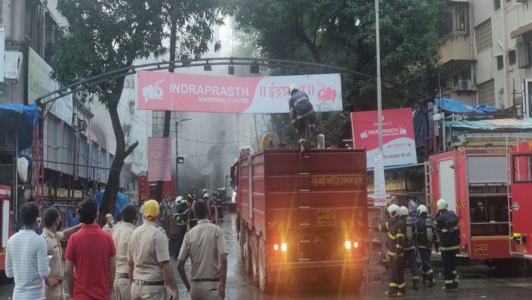 In Pictures Mumbai fire brigade officials in action to douse a major