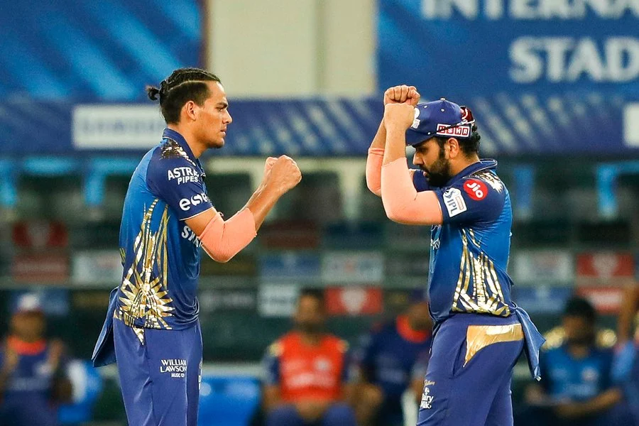 Rahul Chahar (L) with Rohit Sharma