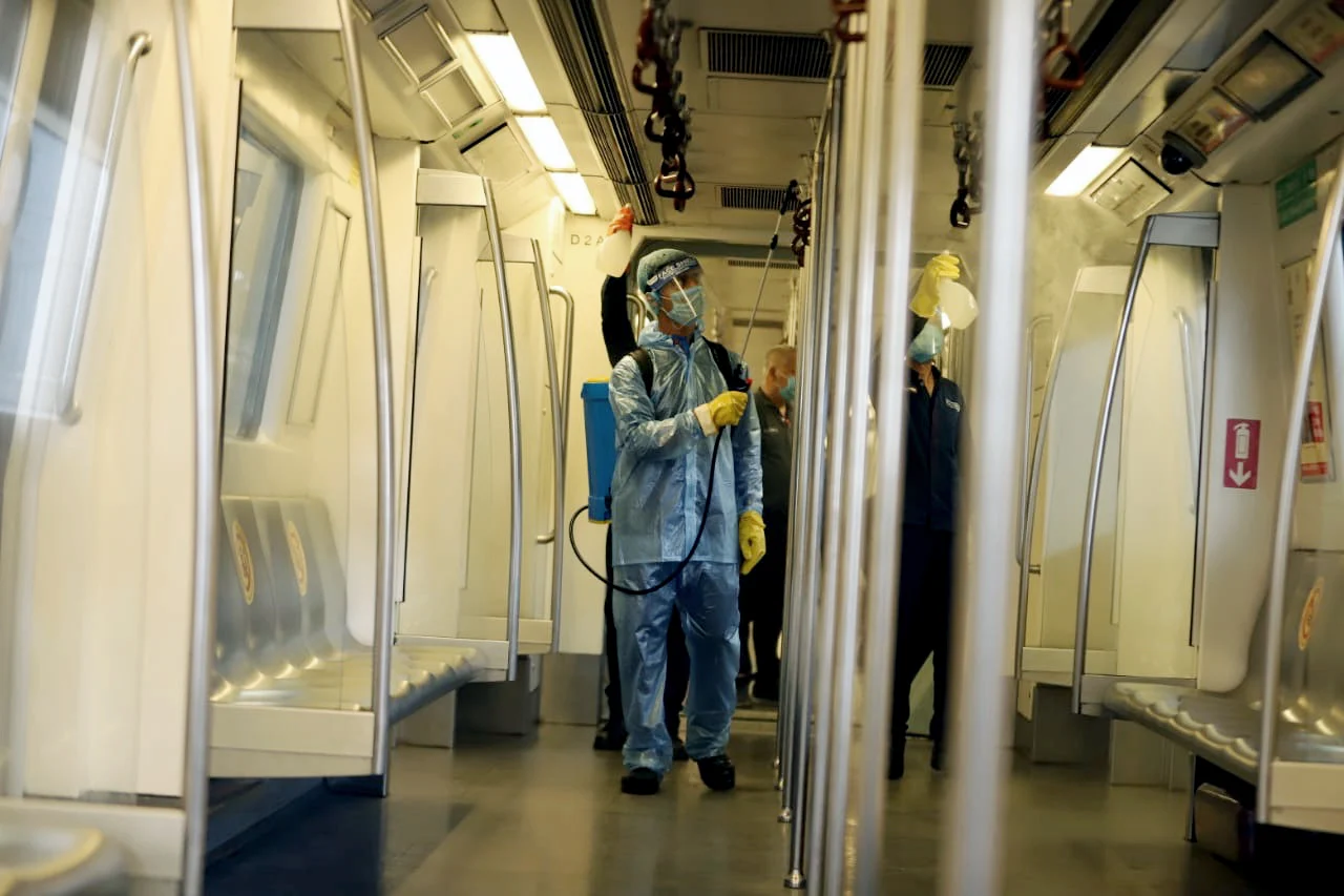 Preparation underway at the metro station as Delhi Metro rail gears up to resume services from Monday as part of Unlock 4, in New Delhi on Sunday.