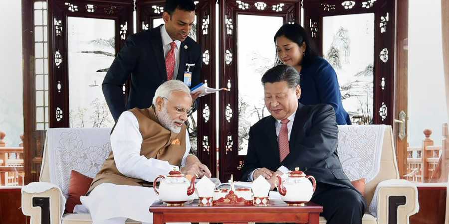 PM Modi enjoys a cup of tea with Xi Jingping