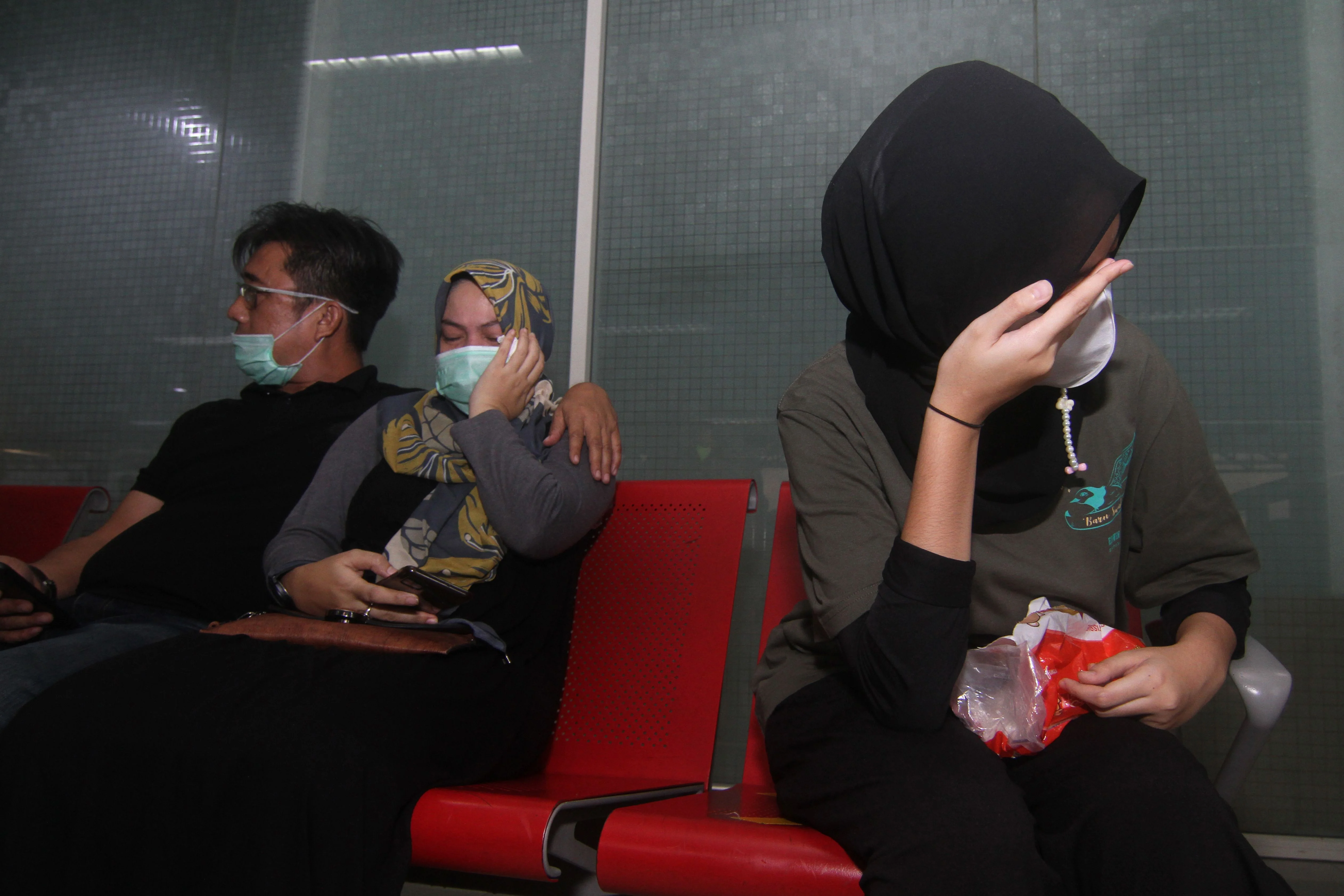 Worried passengers wait for update of their loved ones