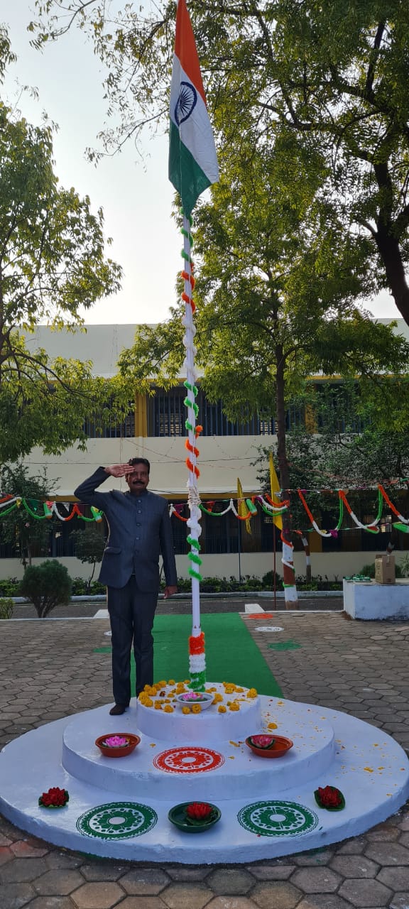 Kendriya Vidyalaya principal Om Lal Brahmachari saluting the national flag during Republic Day celebration in Narmada Nagar village on Tuesday