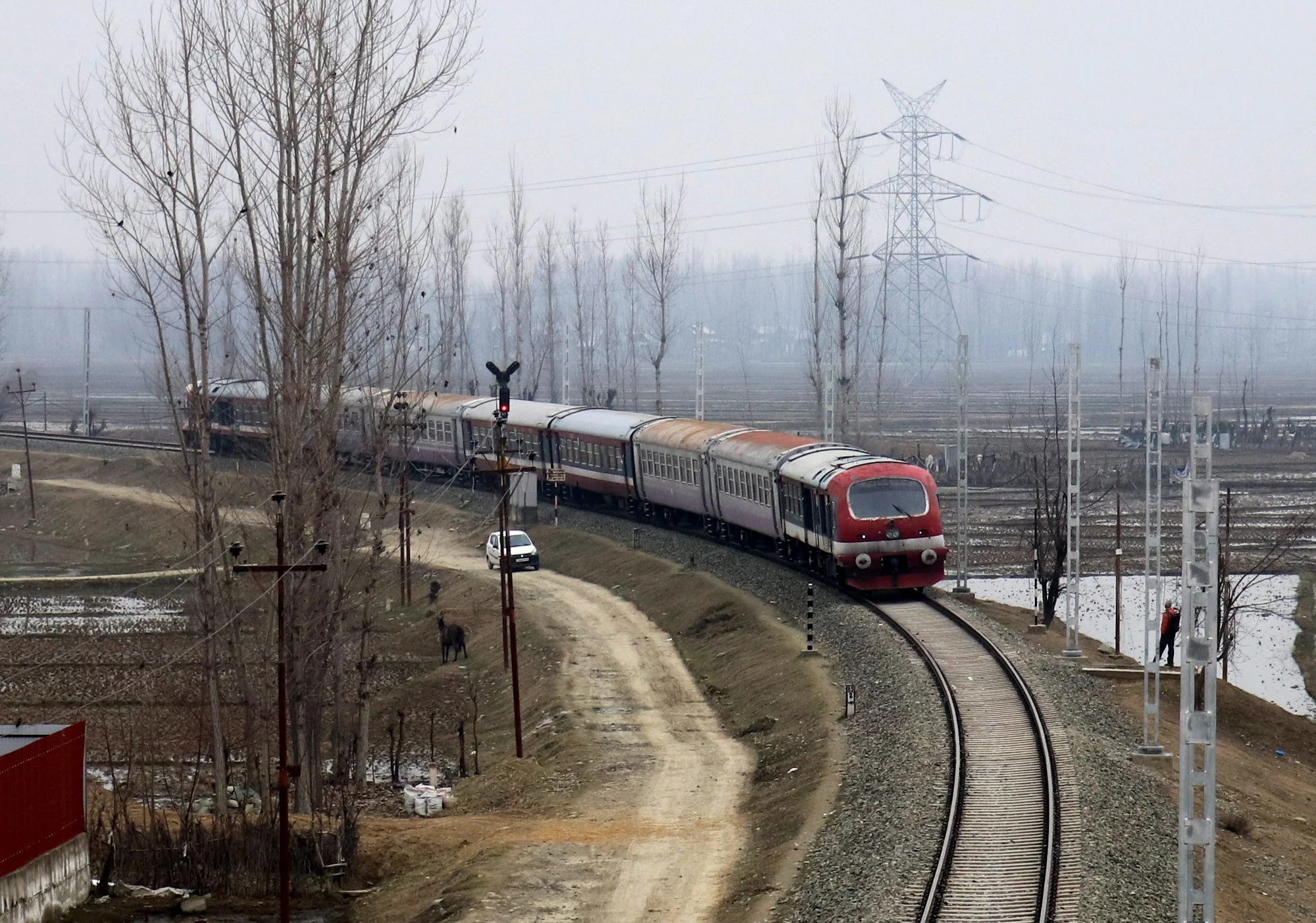 Train arrives at the Nowgam Railway station in Srinagar as the rail service connecting Banihal to Baramulla resumed on Monday. After remaining suspended for 11 months due to the pandemic.