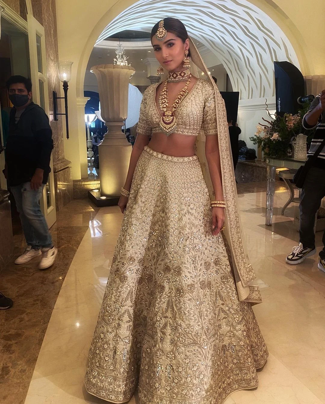 Tara Sutaria stuns in a Rs 3.1 lakh ivory lehenga by Anita Dongre