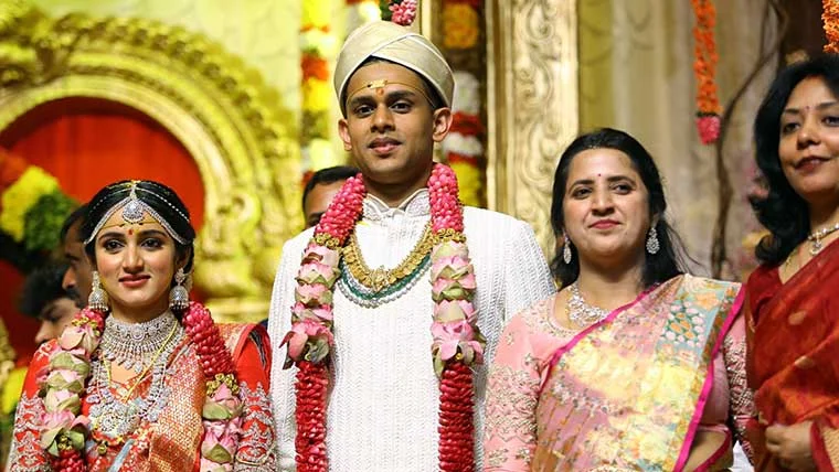 State Congress chief DK Sivakumar with daughter Aishwarya and son in law Amartya Hegde gets clicked during the marriage ceremony