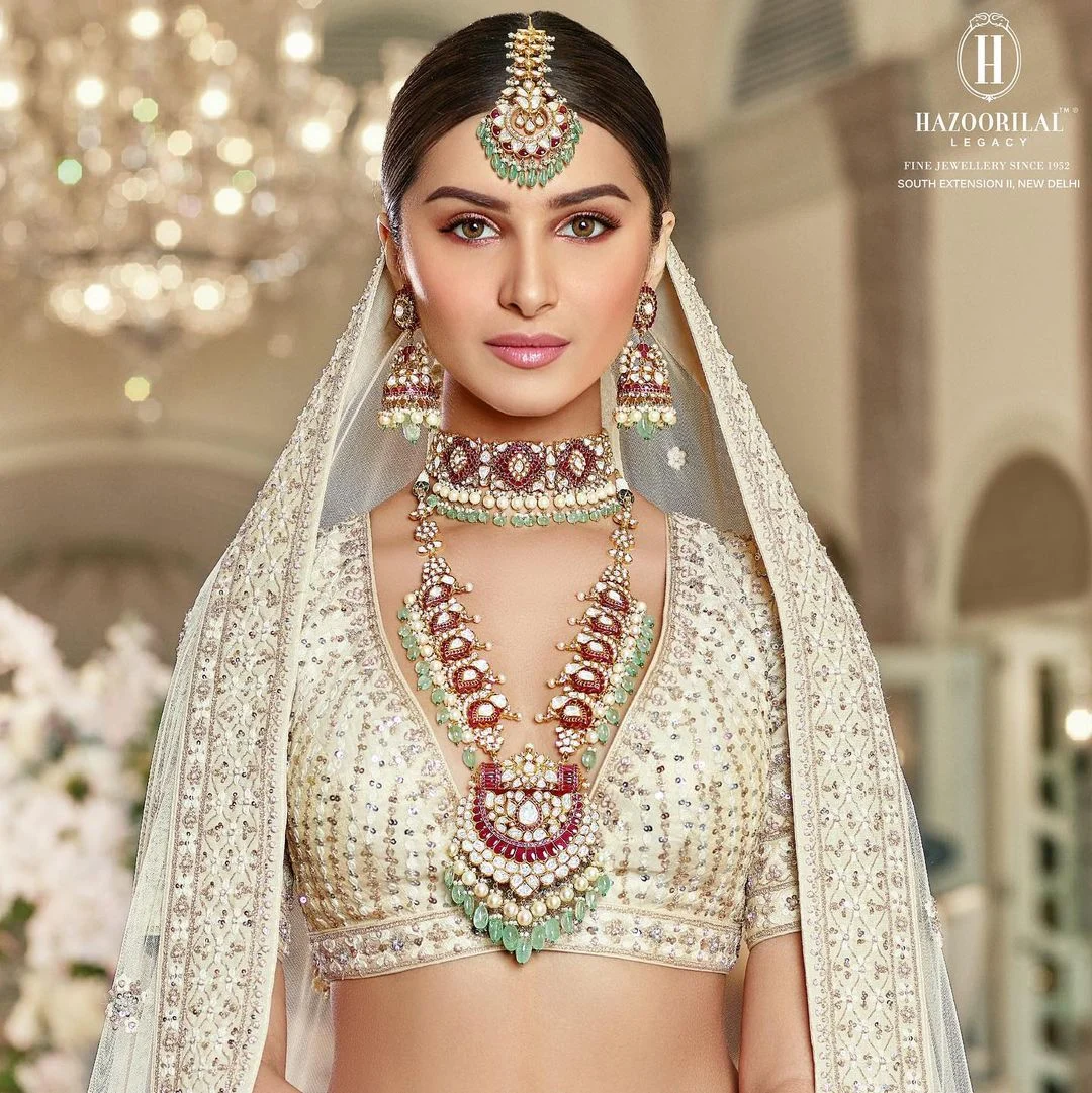 Tara Sutaria stuns in a Rs 3.1 lakh ivory lehenga by Anita Dongre