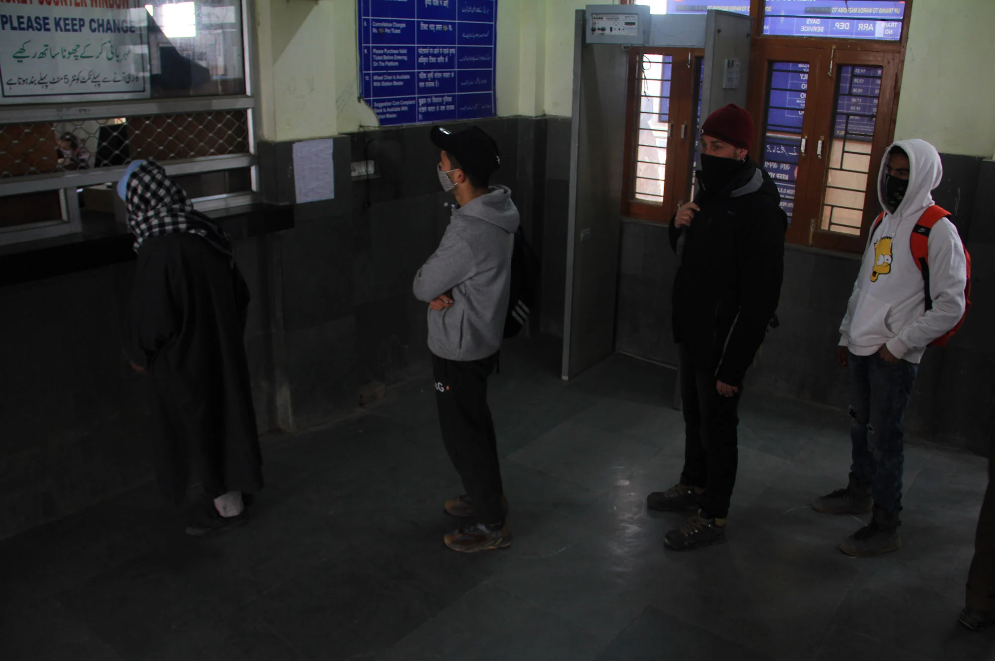 Passengers waiting for a train as the rail service connecting Banihal to Baramulla resumed, in Kashmir on Monda. After remaining suspended for 11 months due to the pandemic.
