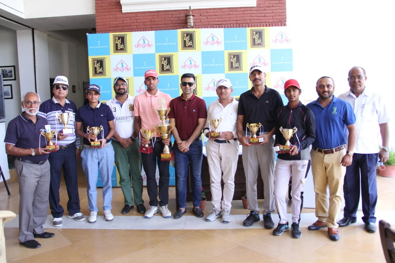 Winners with trophies at Z Black open golf tournament played at Royal Garha Golf Course
