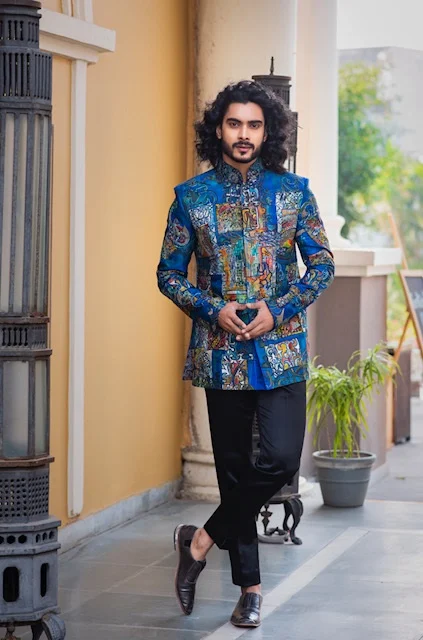 Team up an indigo coat with dapper trousers to stand out in the crowd