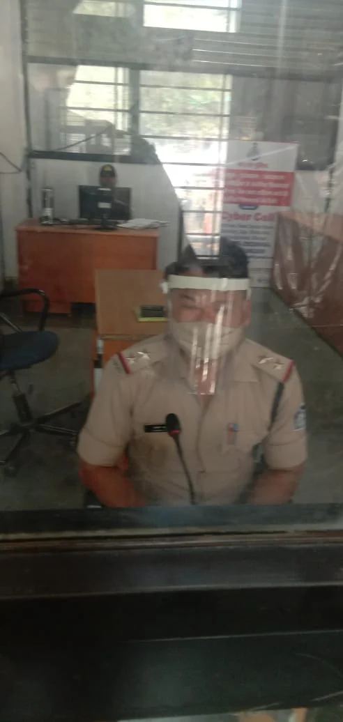 Cop with mask at a police station in Bhopal
