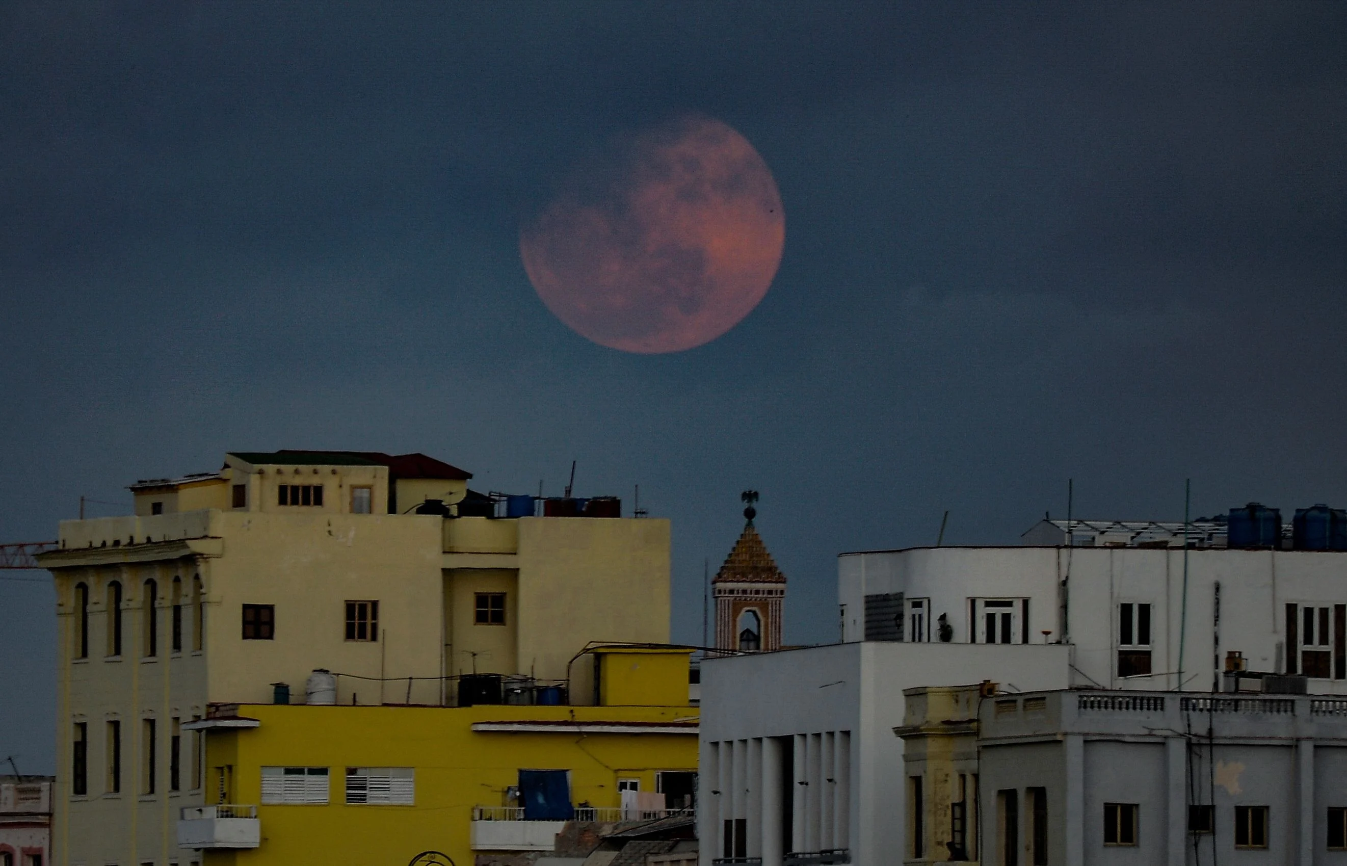 A full Super Pink Moon rises above Havana on April 26, 2021.