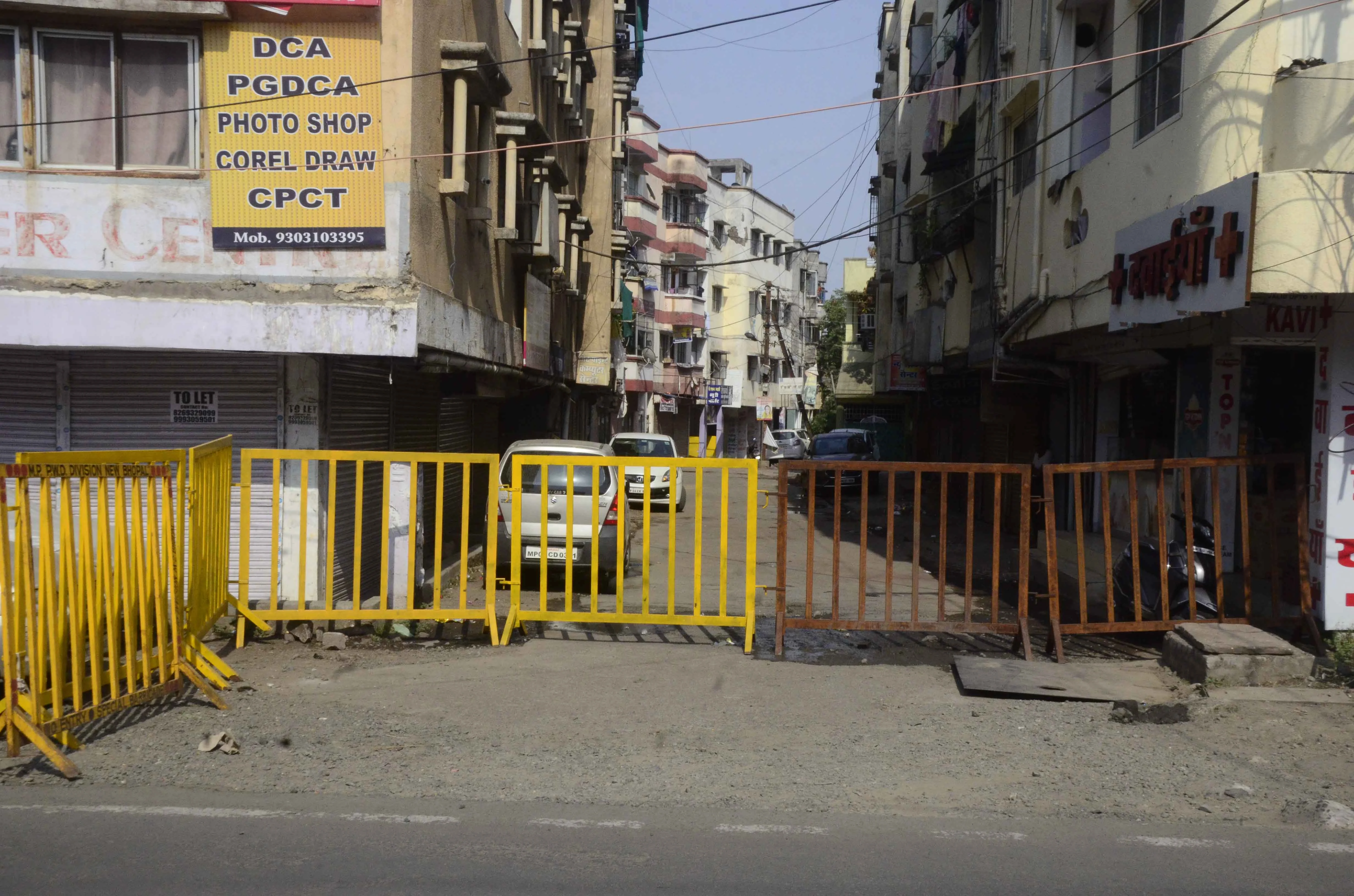Road barricaded in containment areas in the state capital, Bhopal,
on Tuesday.