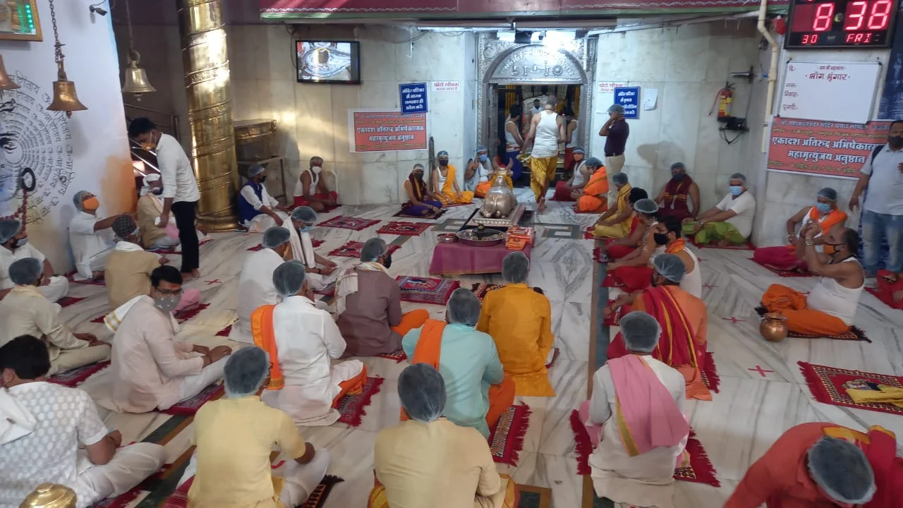 Priests chanting hymns in Nandi Grah at Mahakal temple in Ujjain on Friday