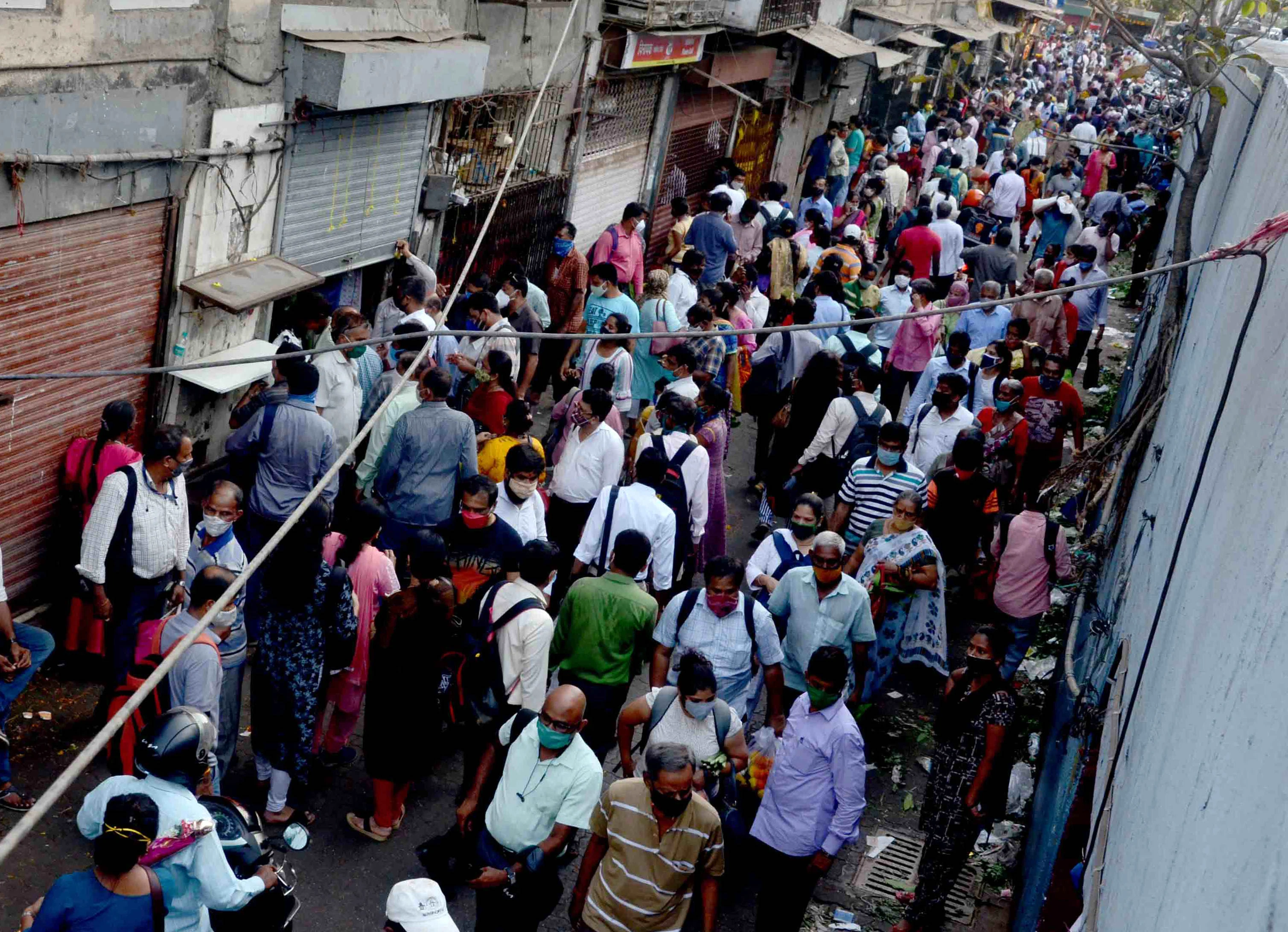 Gudi Padwa 2021: Even as COVID-19 cases soar, crowd gathers at Mumbai's Dadar flower market; see pics