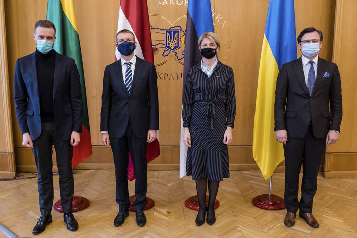 (From left) Lithuanian Foreign Minister Gabrielius Landsbergis, Latvian Foreign Minister Edgars Rinkevics, Estonian Foreign Minister Eva-Maria Liimets and Ukrainian Foreign Minister Dmytro Kuleba pose for a photo prior to their talks in Kyiv, Ukraine, on Thursday. 