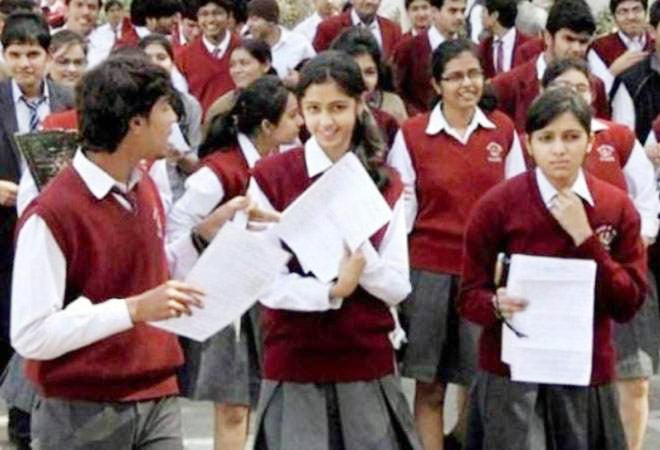 Bhopal: Students of Classes 9 & 11 flock to school to collect question paper & answer copies for final exams