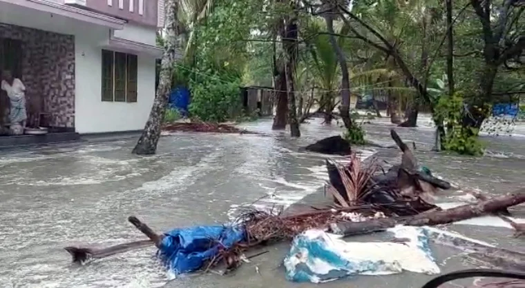 A view of a waterlogged street due to heavy rains continues to lash the city under the influence of Cyclone Taukta