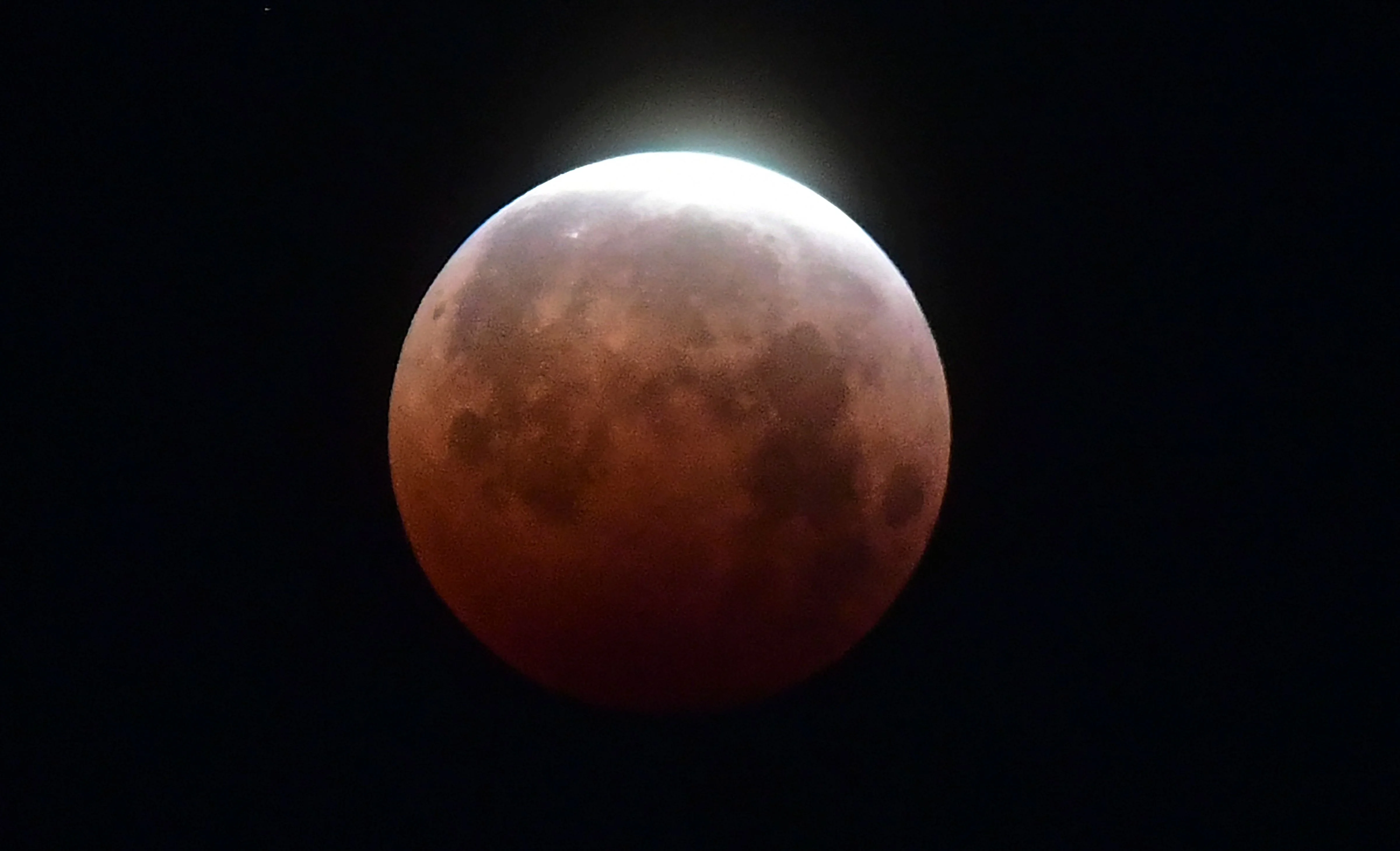 The Moon as seen over Santa Monica, California on May 26, 2021 during the "Super Blood Moon" total eclipse.