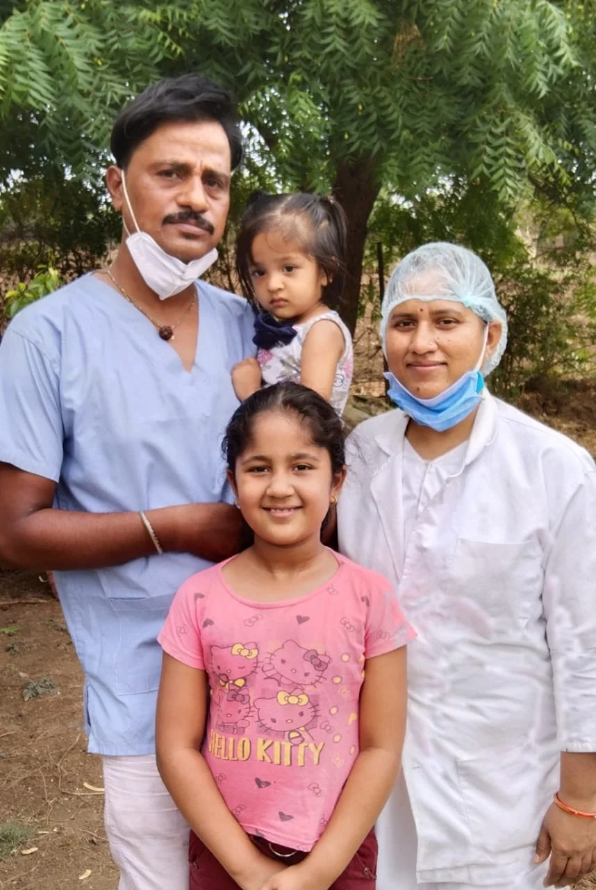 Rajesh Sharma and wife Radhika Sharma with their two daughters