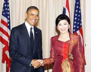 US President Barack Obama shakes hands with Thai Prime Minister Yingluck Shinawatra during their meeting at Government house in Bangkok on Sunday.