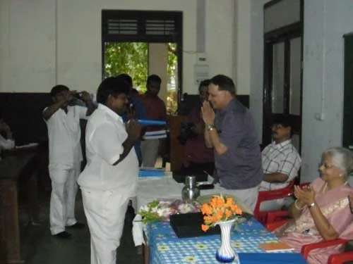 Hemant Takale, MLC, NCP greeting a new student along with Rupa Shah, former VC,SNDTUniversity