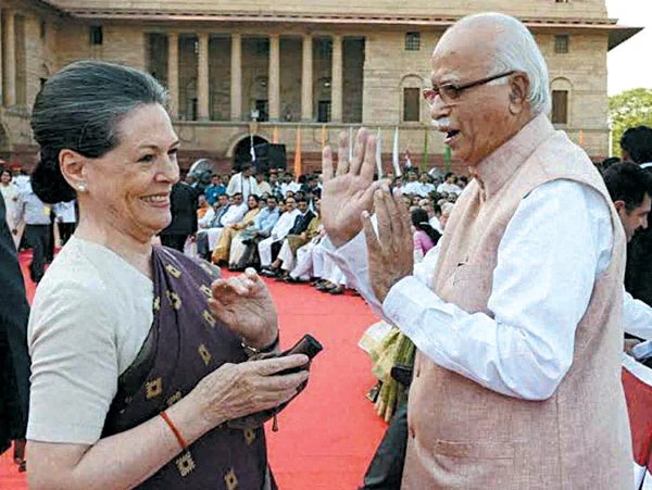 AND THE TWAIN MET: Senior BJP leader LK Advani and Congress President Sonia Gandhi exchanging pleasantries.