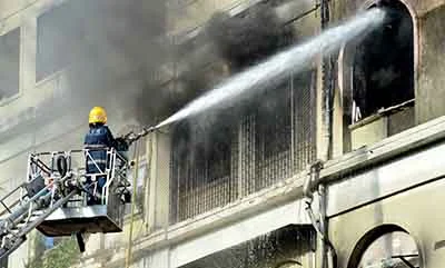 Mumbai: A massive fire broke out in the Metro House building on the Colaba Causeway, a busy commercial street in south Mumbai .Photo by BL SONI