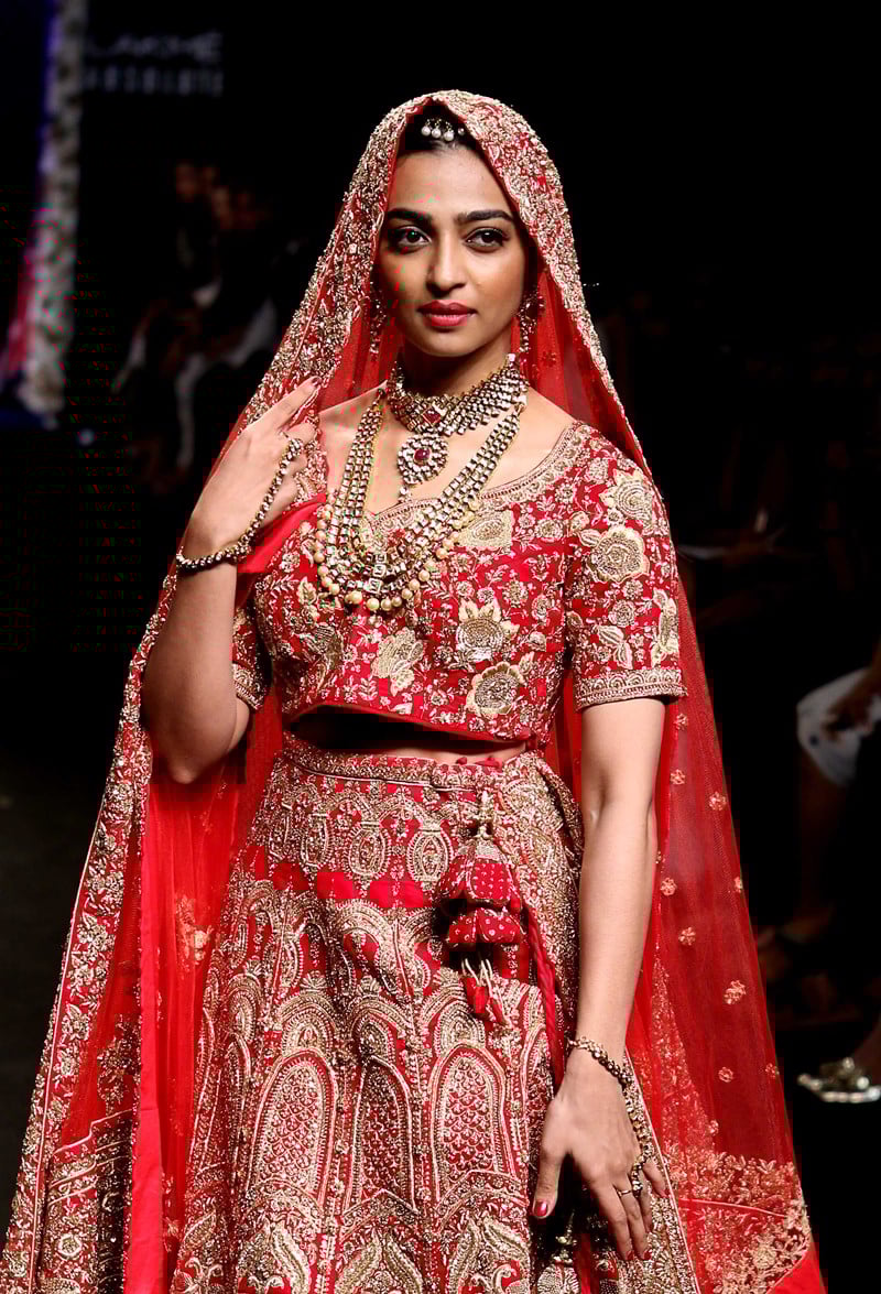 <strong>Indian Bollywood actress Radhika Apte showcases a creation by designer Saroj Jalan at Lakme Fashion Week (LFW) Winter/Festive 2016 in Mumbai on late August 28, 2016.</strong>