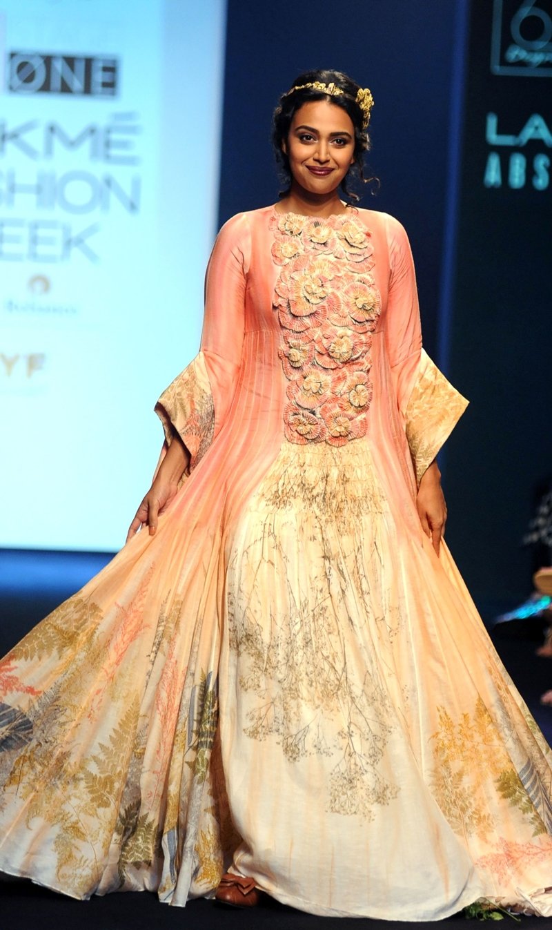 Indian Bollywood actress Swara Bhaskar showcases a creation by designer Whimsical during the Lakme Fashion Week (LFW) Winter/Festive 2016 in Mumbai on August 26, 2016.