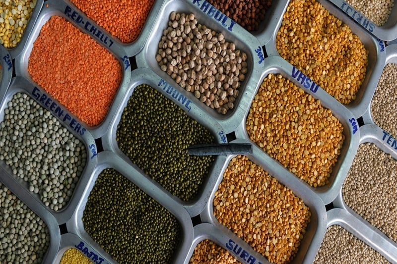Pulses and food grains are seen for sale at a shop at the Agricultural Produce Marketting Committee (APMC) Yard in the Indian city of Bangalore on October 29, 2014.  AFP PHOTO/Manjunath KIRAN        (Photo credit should read MANJUNATH KIRAN/AFP/Getty Images)