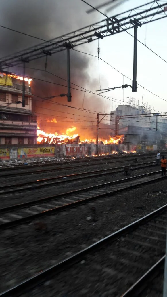 Fire near tracks disrupts local trains in Mumbai