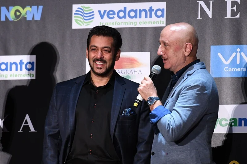 Bollywood actor Salman Khan (L) smiles as Anupam Kher speaks during a press conference ahead of the 18th International Indian Film Academy (IIFA) Festival, in New York, on July 13, 2017. / AFP PHOTO / ANGELA WEISS