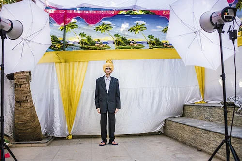 Makeshift photo studio for family portraits at a wedding in Ahmedabad
