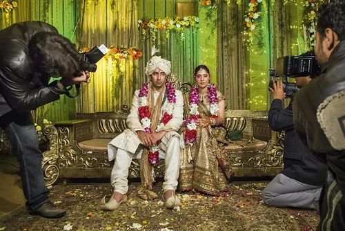 The exhausted couple and their energetic photographers