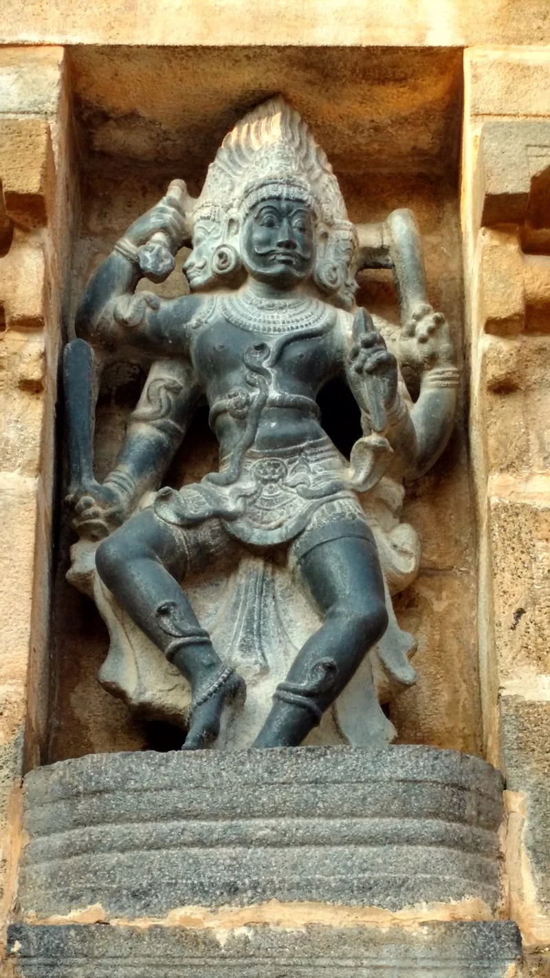 The Kala Bhairava on the external side-walls of the Temple