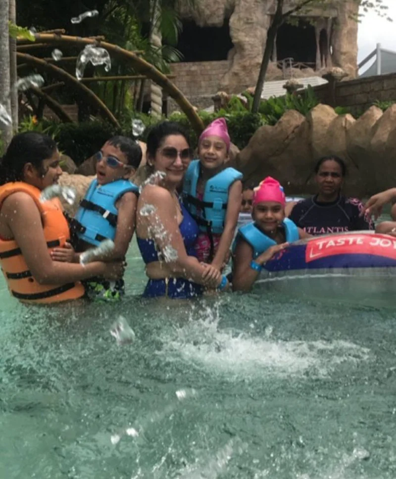 Maanayata Dutt is chilling and relaxing in a pool with kids Iqra and Shahraan