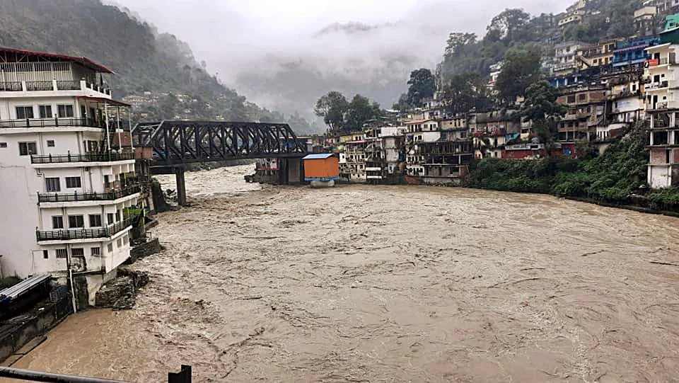 ): Bathing ghats submerged underwater at the confluence of Alakananda River and Pindar river due to heavy rainfall, in Chamoli on Tuesday.