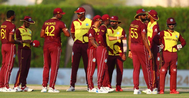 West Indies celebrate a wicket.