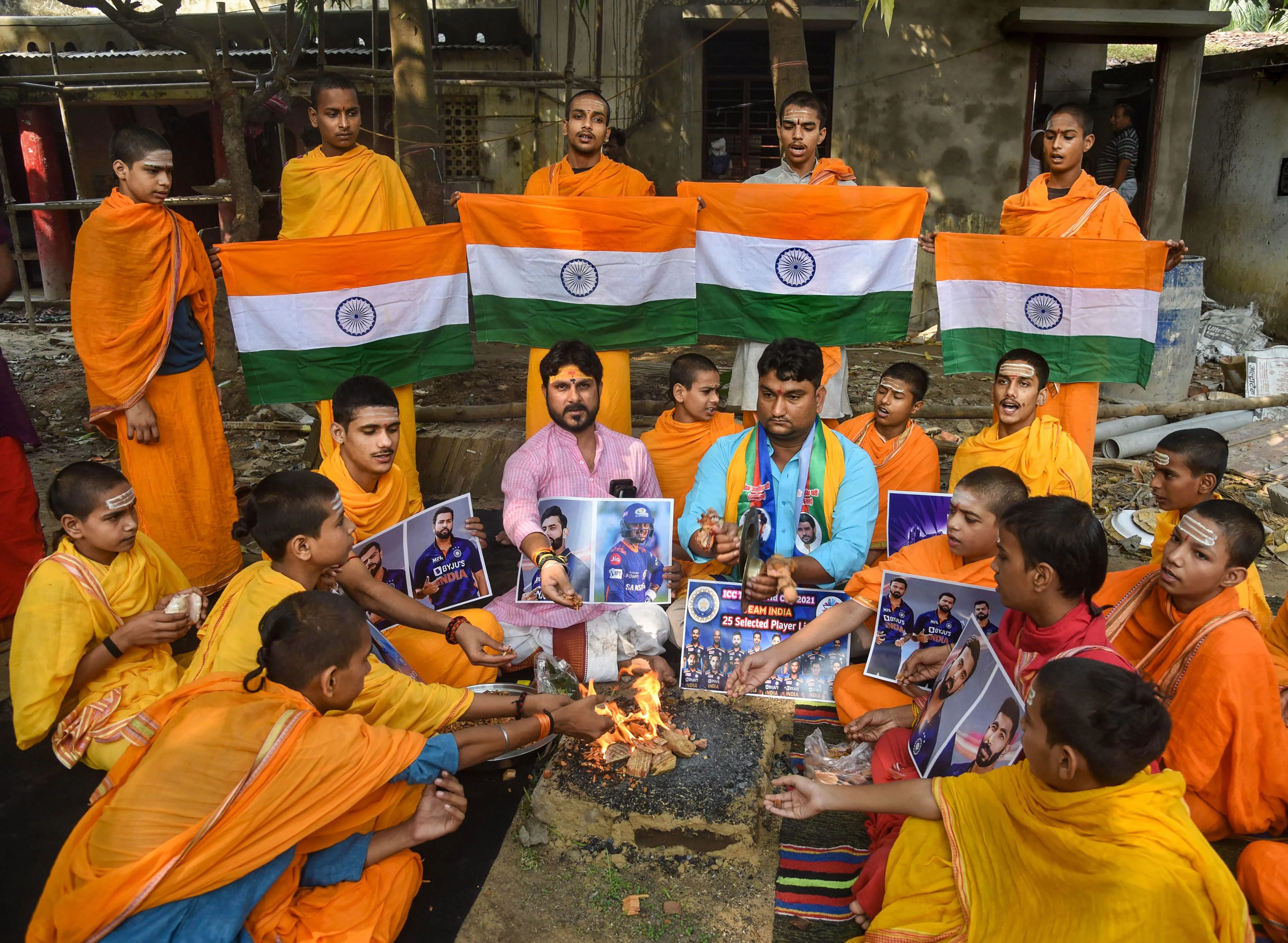 Lok Janshakti Party (Ramvilash) party activists and students of Sant Pashupatinath Ved School perform hawan for Indian cricket team ahead of their match against Pakistan at ICC Mens T20 World Cup, in Patna, Sunday, Oct. 24,2021