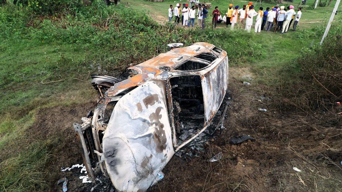 Charred remains of a vehicle which set ablaze in Sunday's violence during farmers' protest, in Lakhimpur Kheri